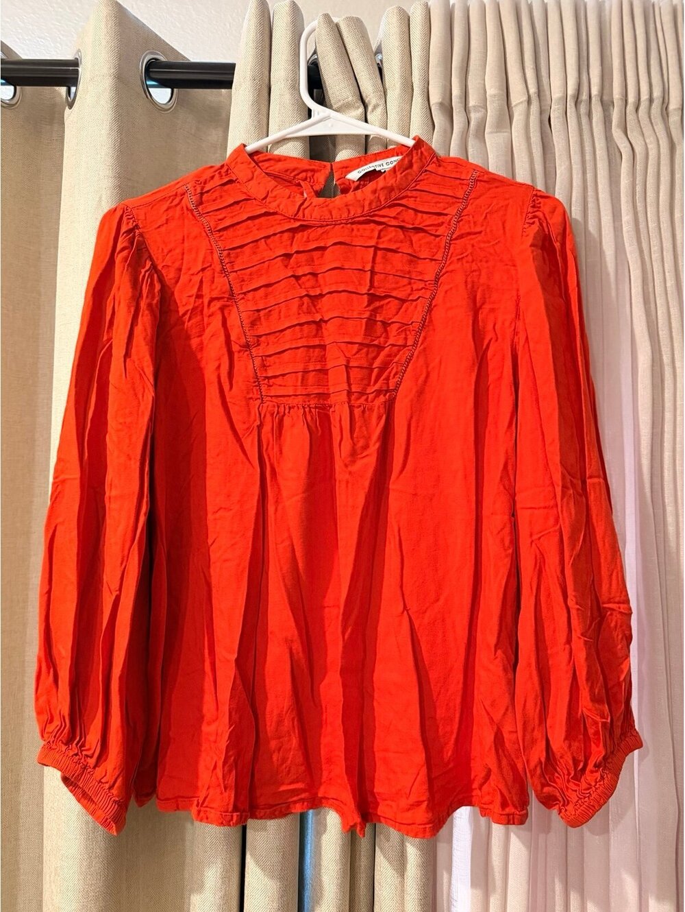 Orange Long Sleeve Blouse with Ruffle Detail